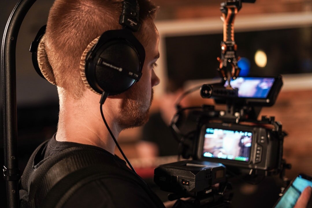 Media editor working on video content across multiple monitors